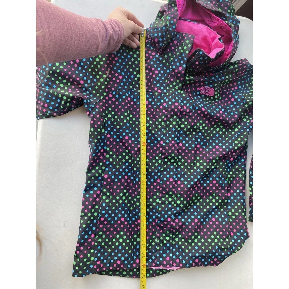 The North Face features zip face