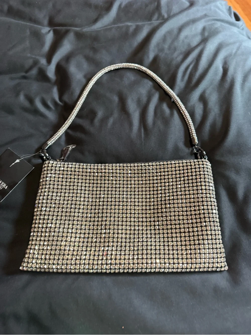 Simply Vera Vera Wang contents covered wristlet