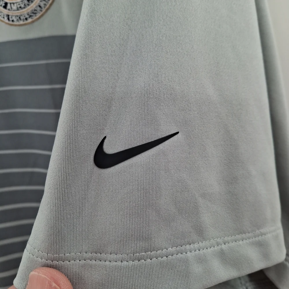 Nike while by