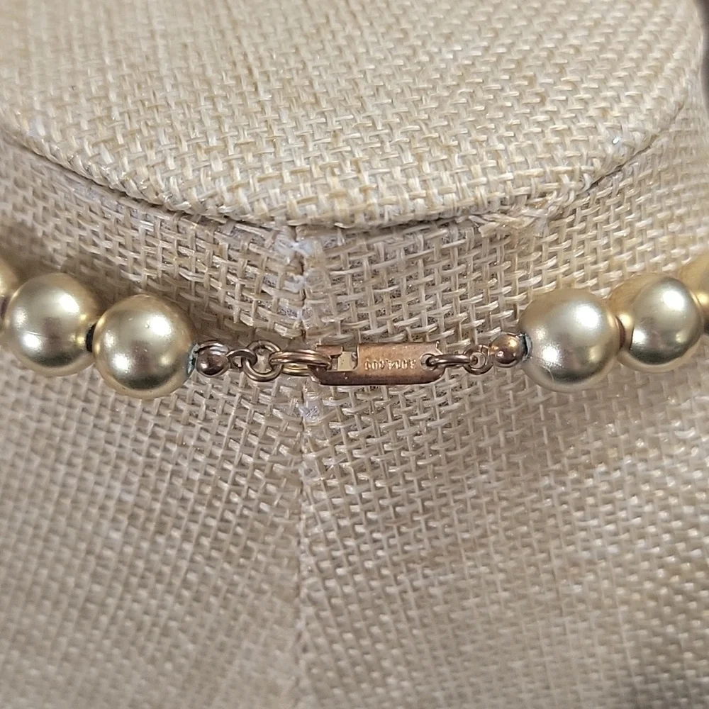 Dauplaise vintage gold