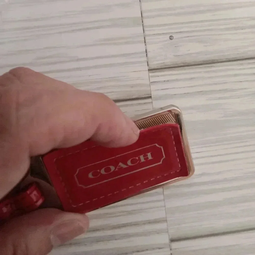 Coach red tag