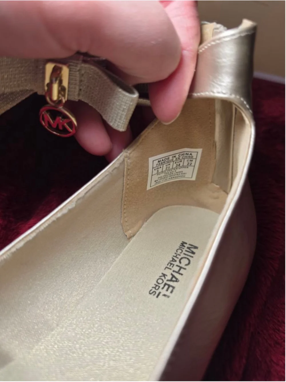 Michael Kors flats feature pre