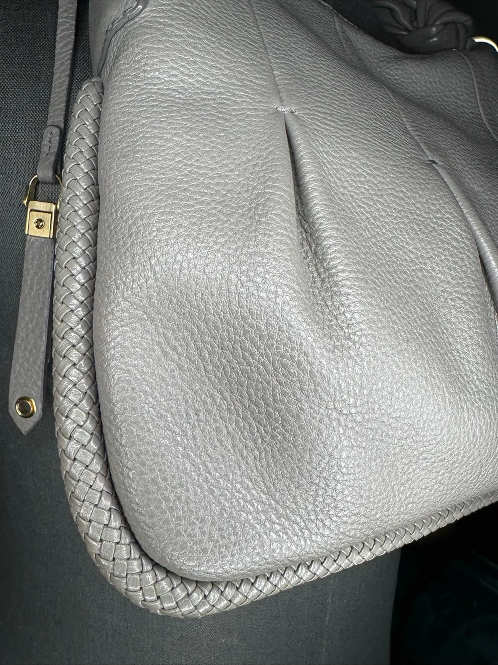 Cole Haan features tassel