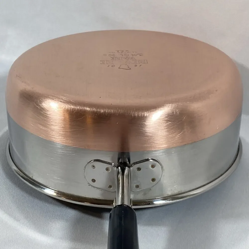 Revere age scratches lid