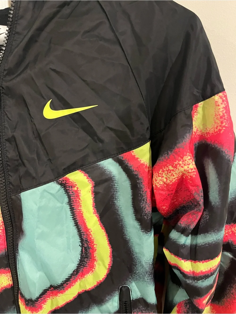 Nike windbreaker featuring