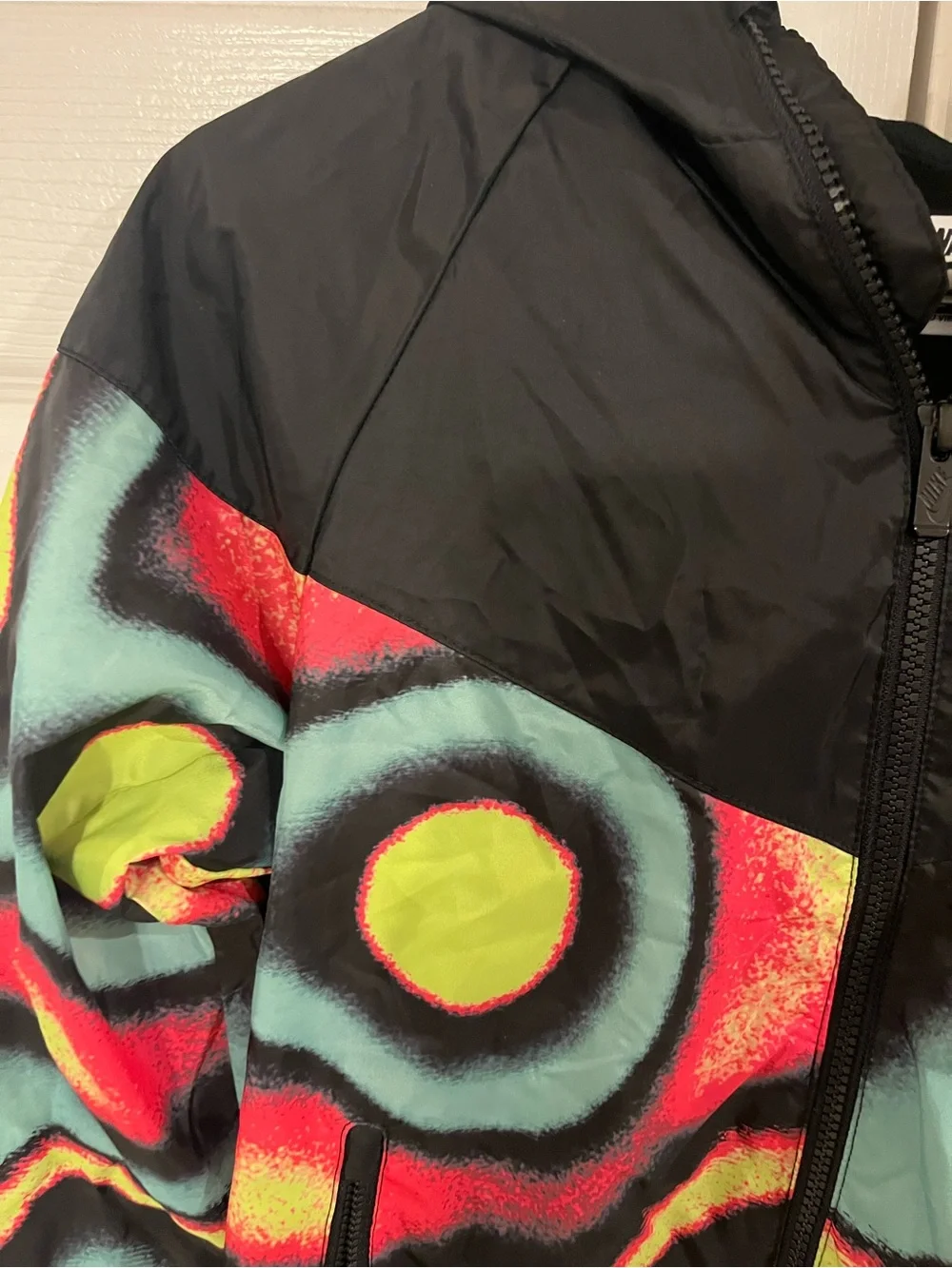 Nike windbreaker featuring