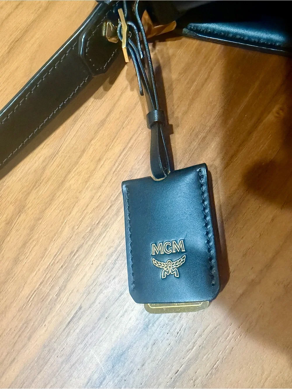 MCM polished adjustable strap
