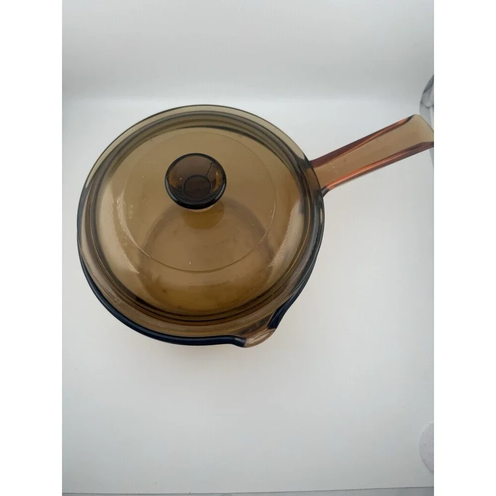 Pan is Vision Corning, Lid is PYREX good no