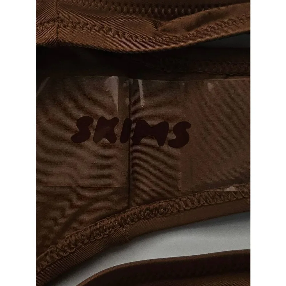 SKIMS almond color