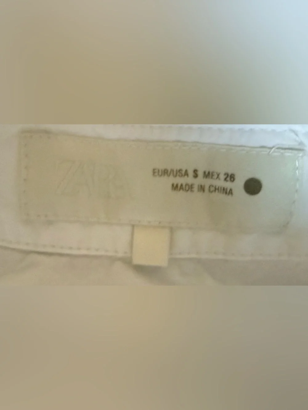 Zara structured button