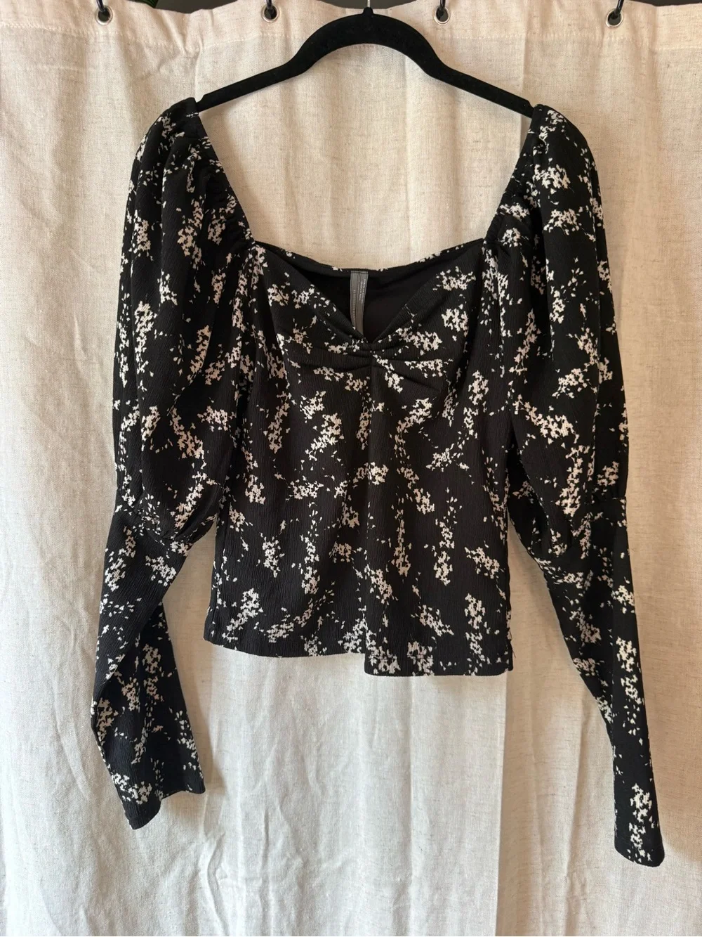 Anthropologie Black Top with White Floral Print and Puff Sleeves
