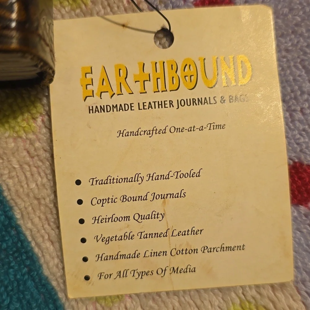 EARTHBOUND brown embossed