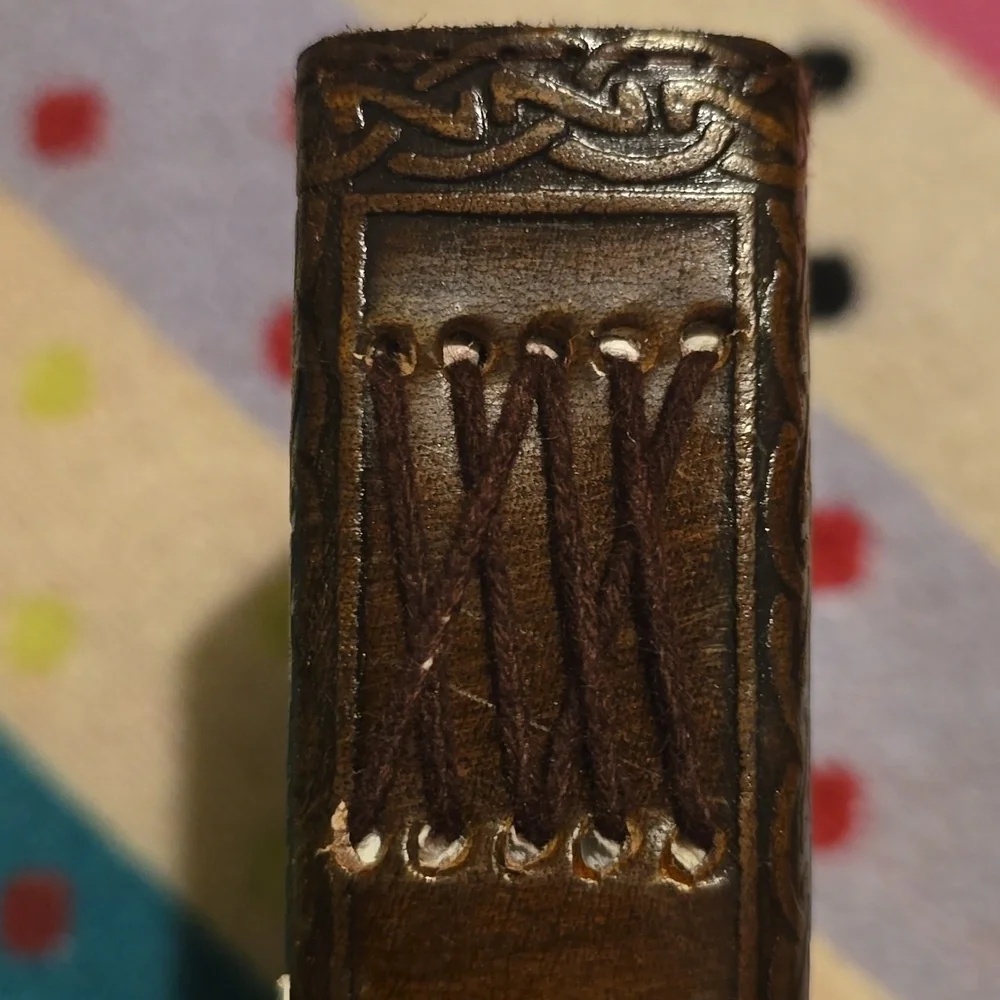 EARTHBOUND brown embossed