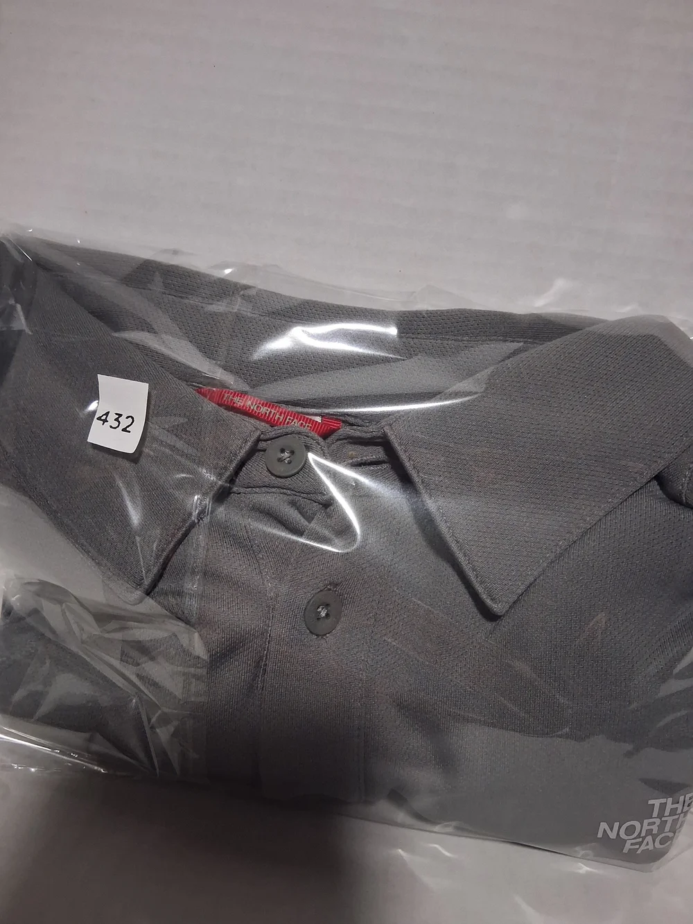 The North Face polo gray