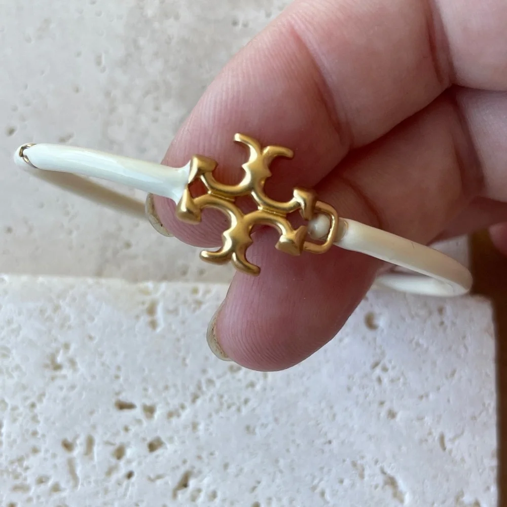 Tory Burch sleek gold everyday
