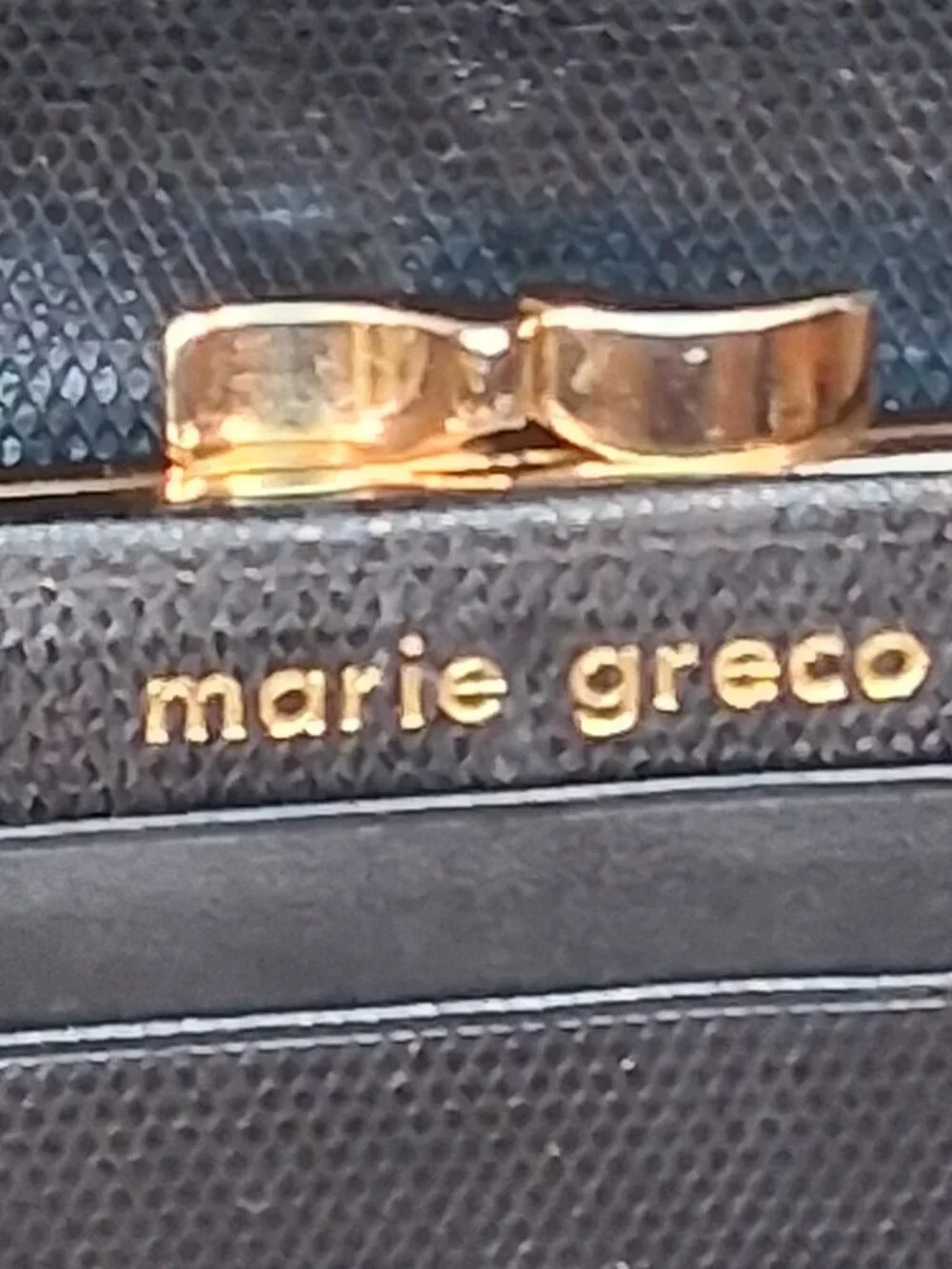 Marie Greco description brand