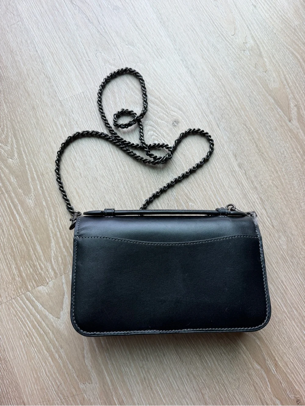 Coach sleek black