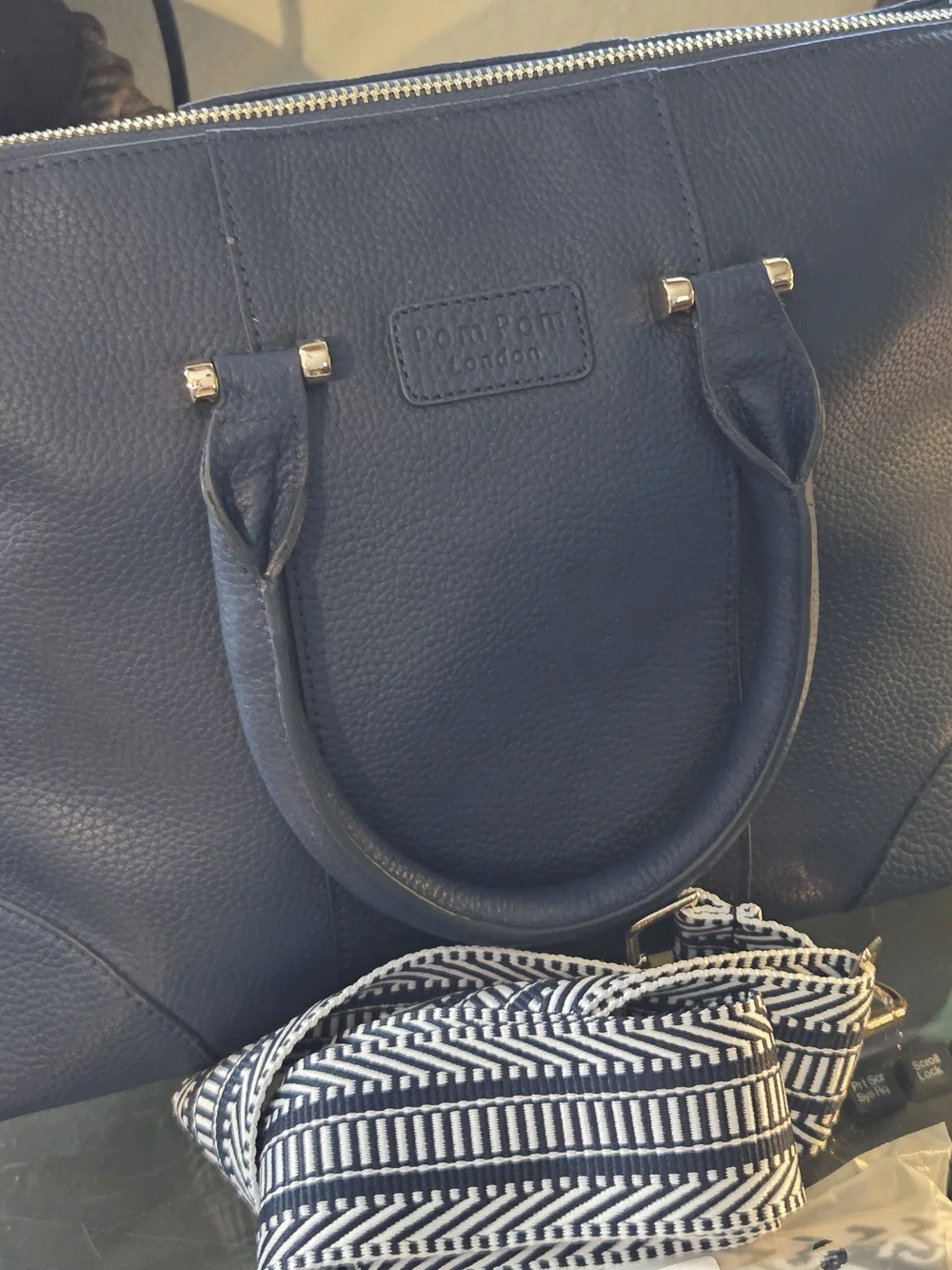Pom Pom London available crossbody canvas