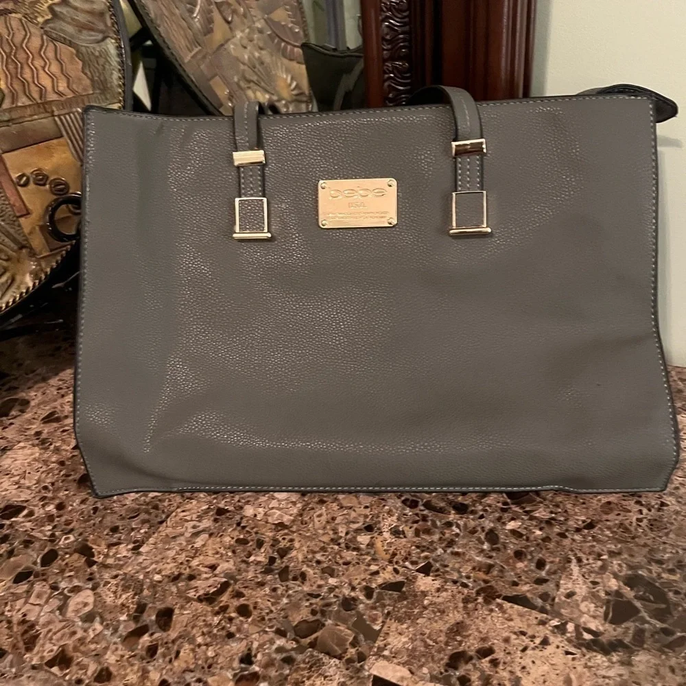 Bebe shoulder bag with additional strap attached