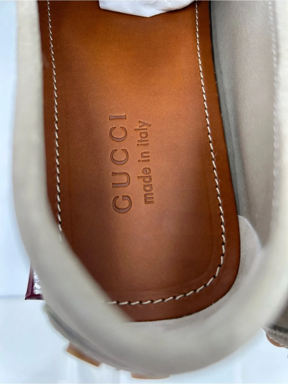 Gucci embossed comes