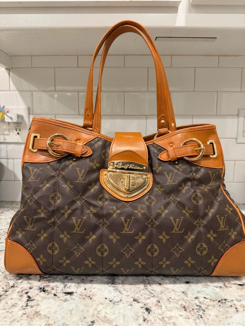 Louis Vuitton quilted handles