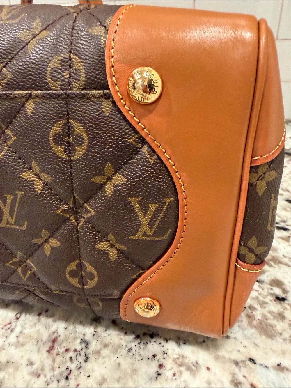 Louis Vuitton accents lock