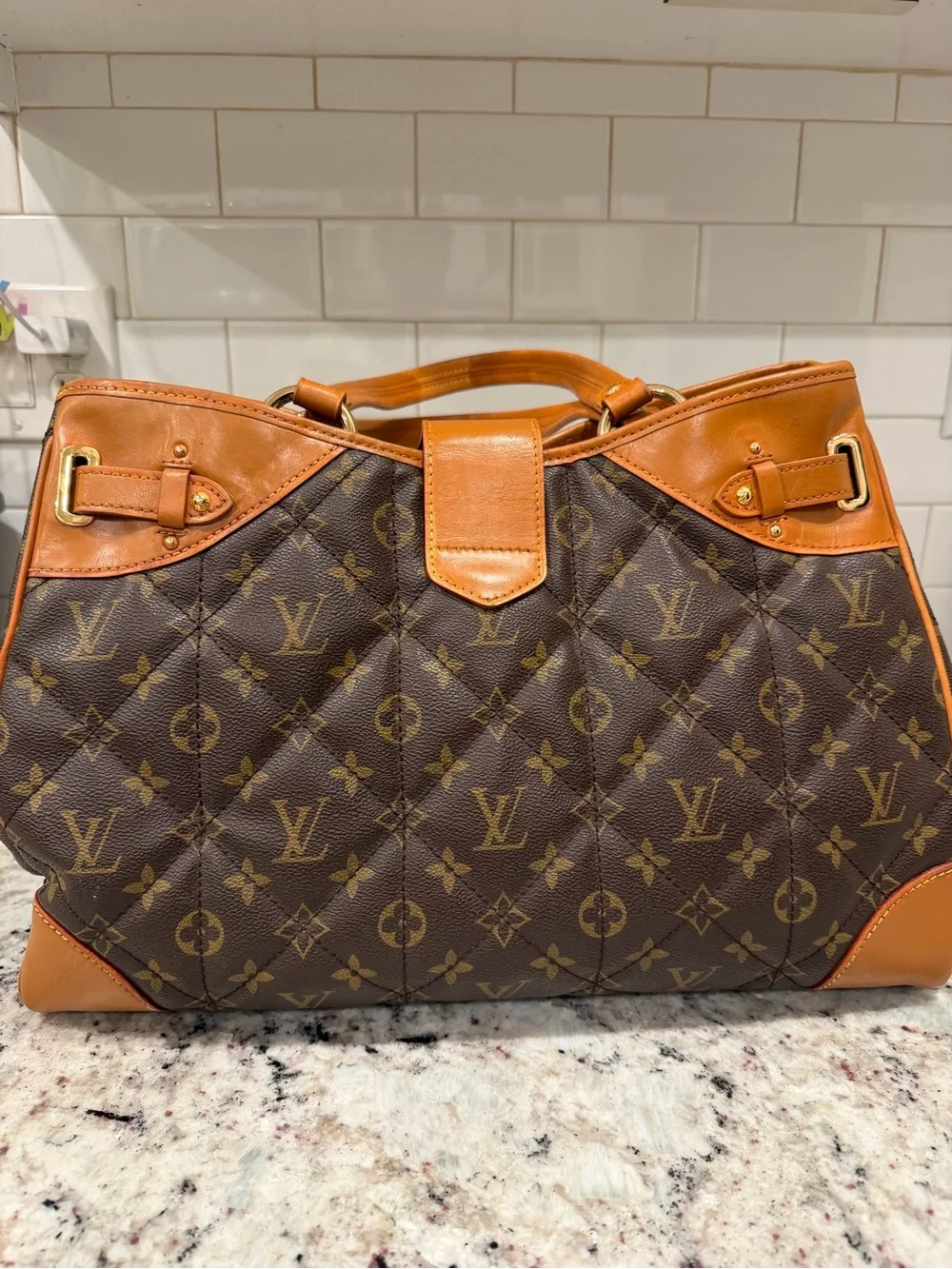 Louis Vuitton gold has
