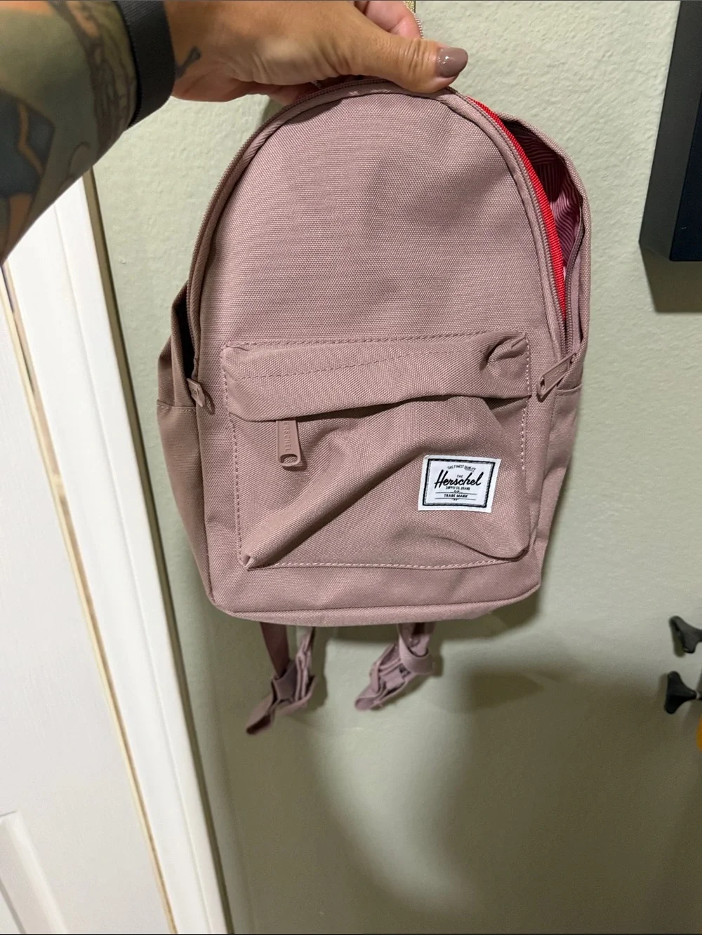 Herschel Supply Company pocket red zip