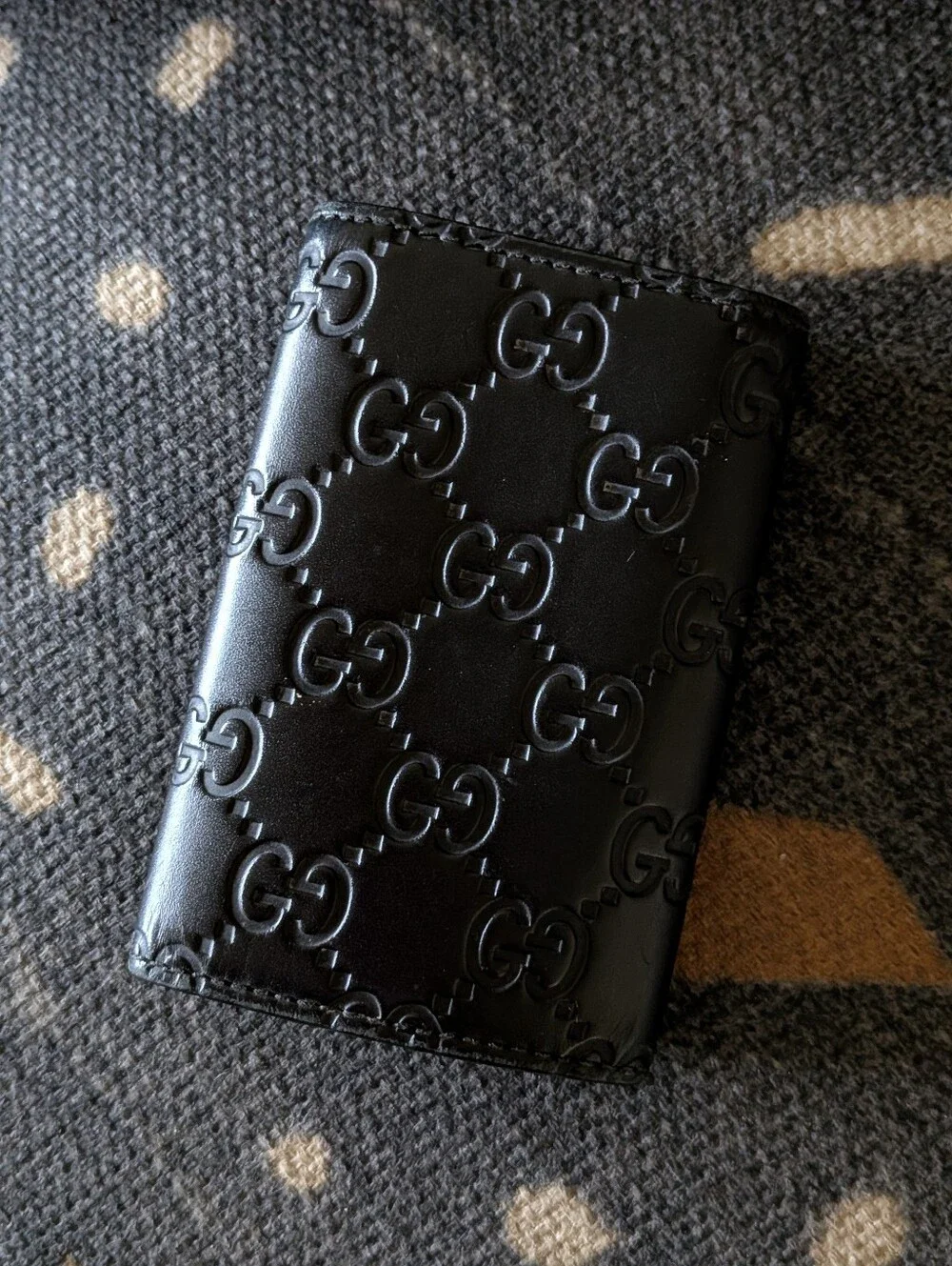 Gucci ​condition debossed