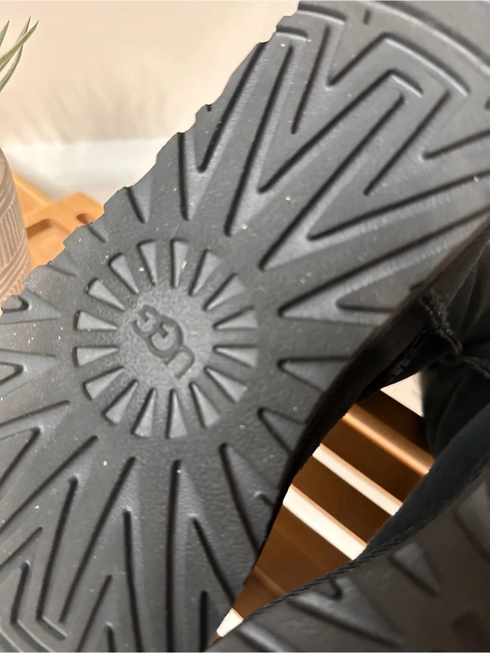 UGG sole days button
