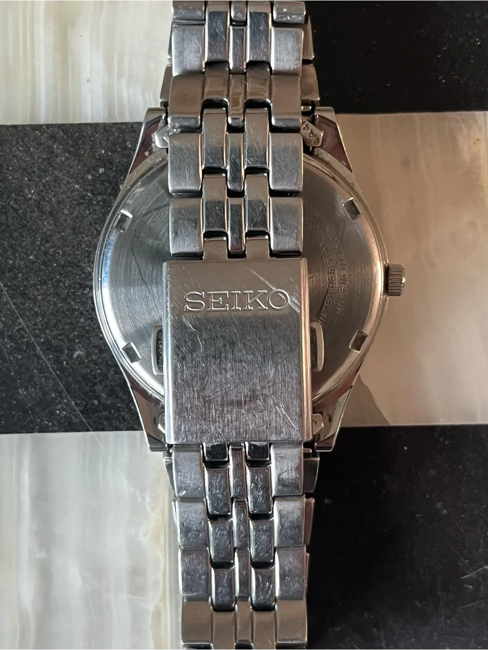 Seiko button this it