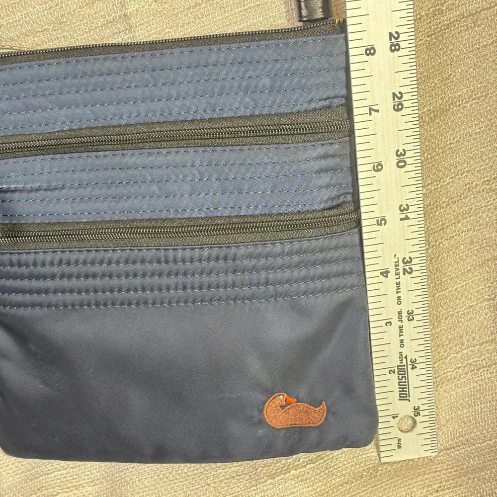 Dooney & Bourke nautical sleek triple