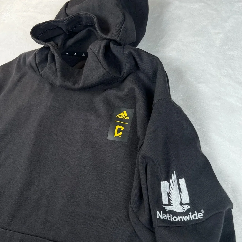 adidas combines sleeve alongside