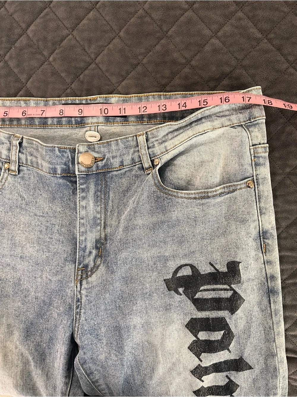 Palm Angels designer jeans logo