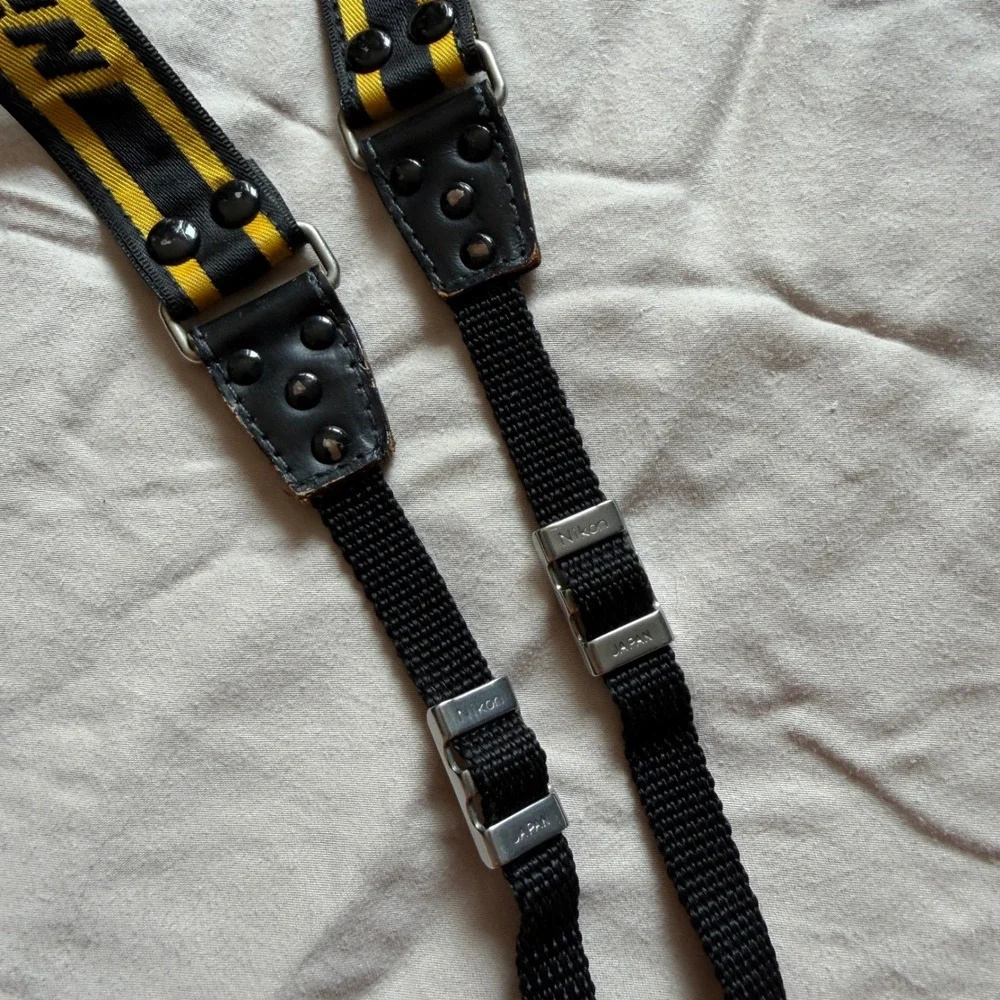 Nikon maintain buckles like