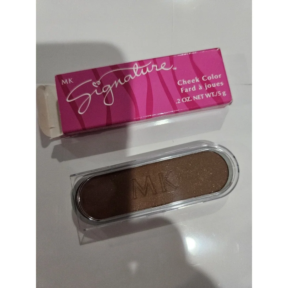 Mary Kay bronze new check
