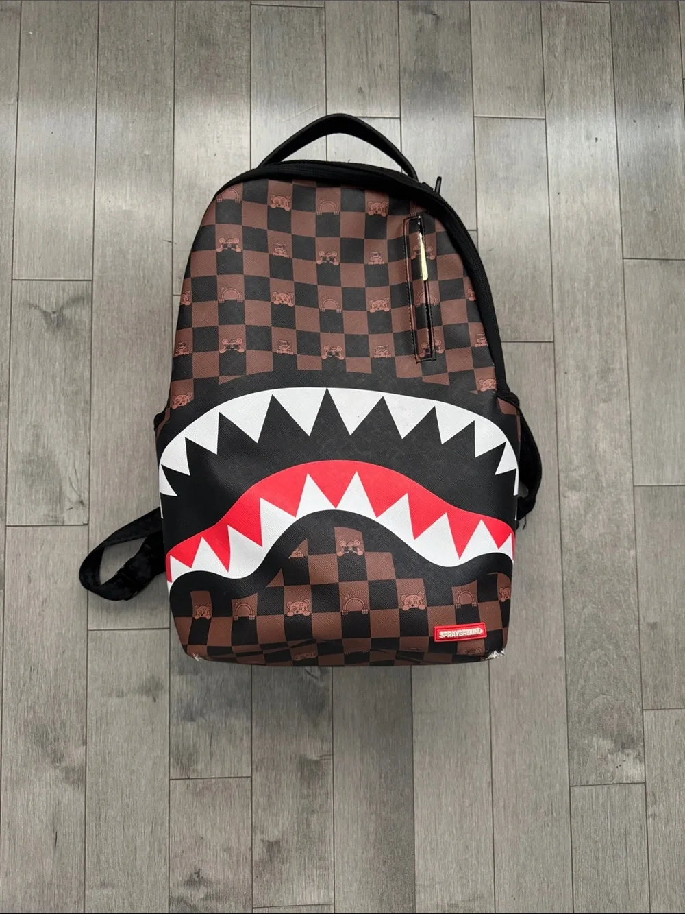 Sprayground Brown Checker Shark-Mouth Backpack with Red & White Accent