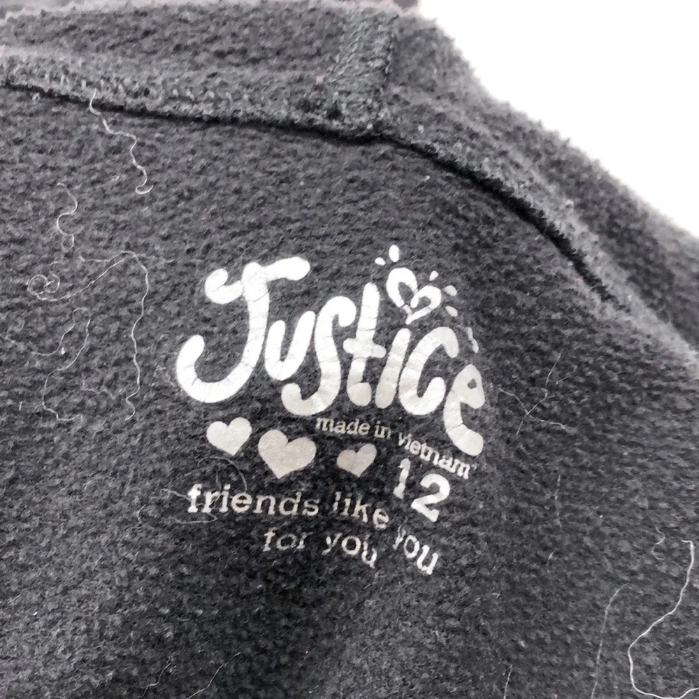 Justice up 12 fading