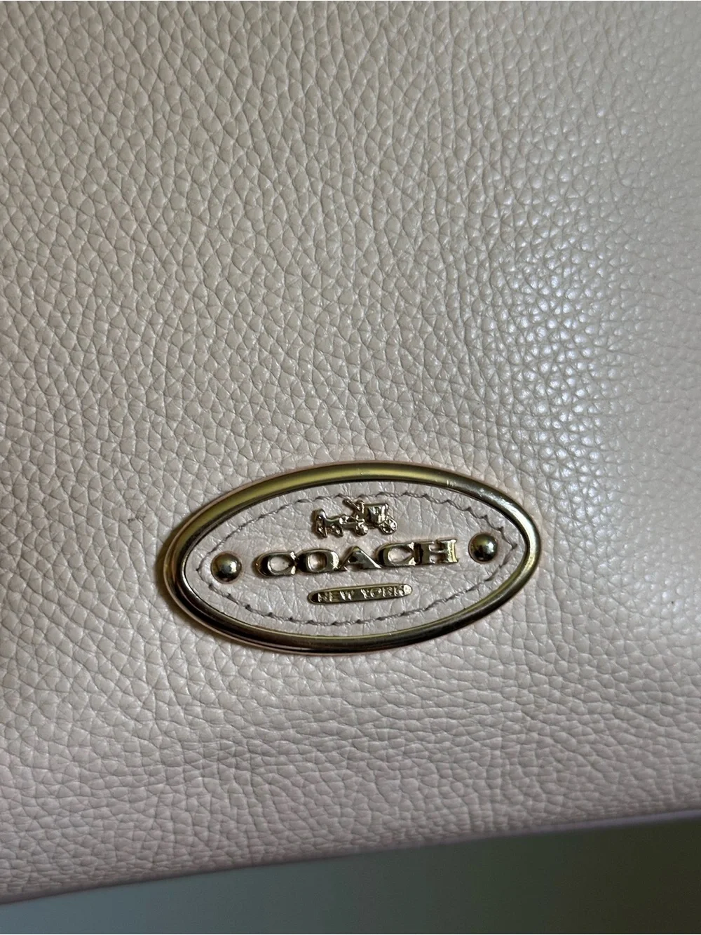 Coach any photographed not
