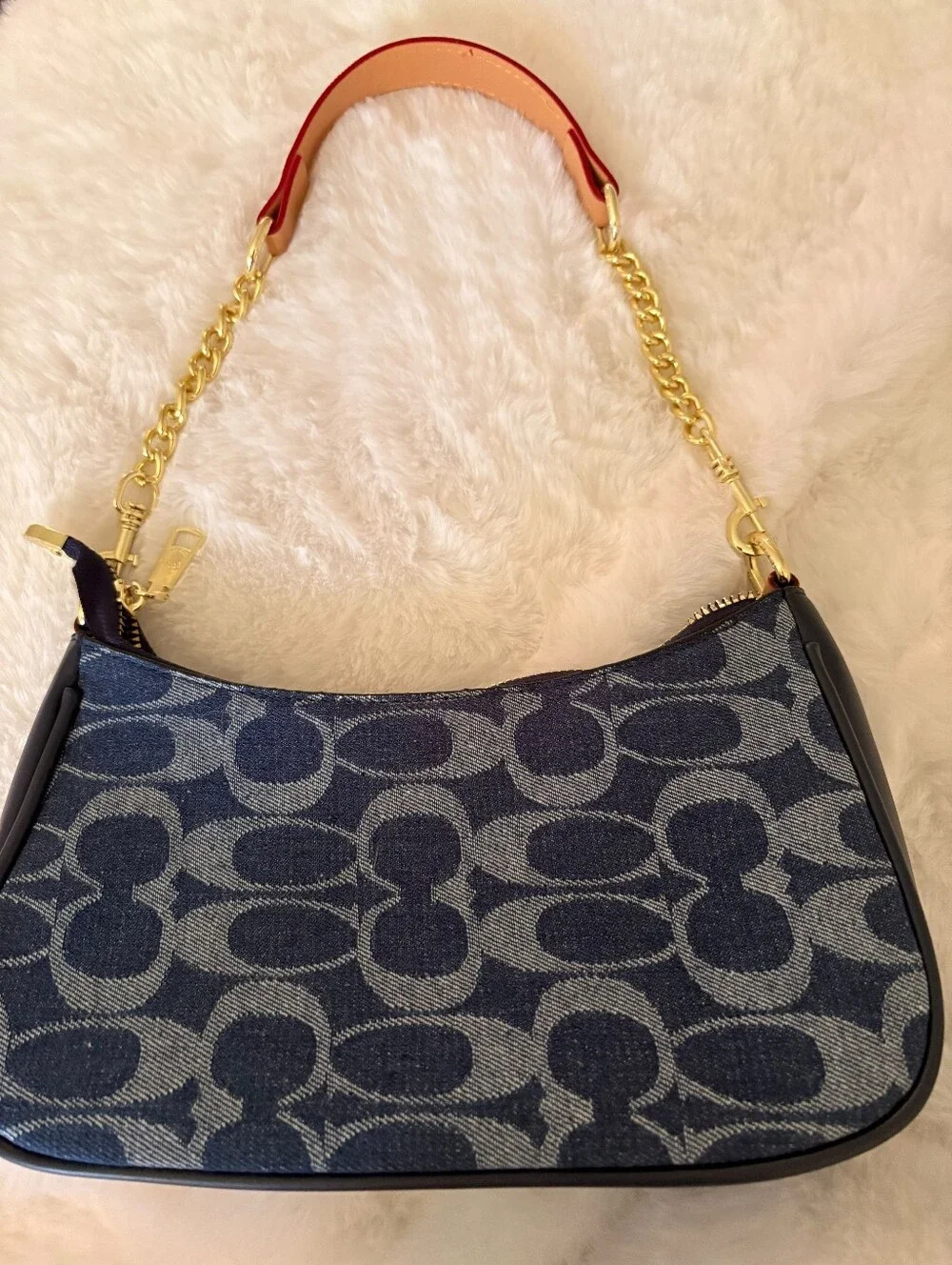 Coach gold tone
