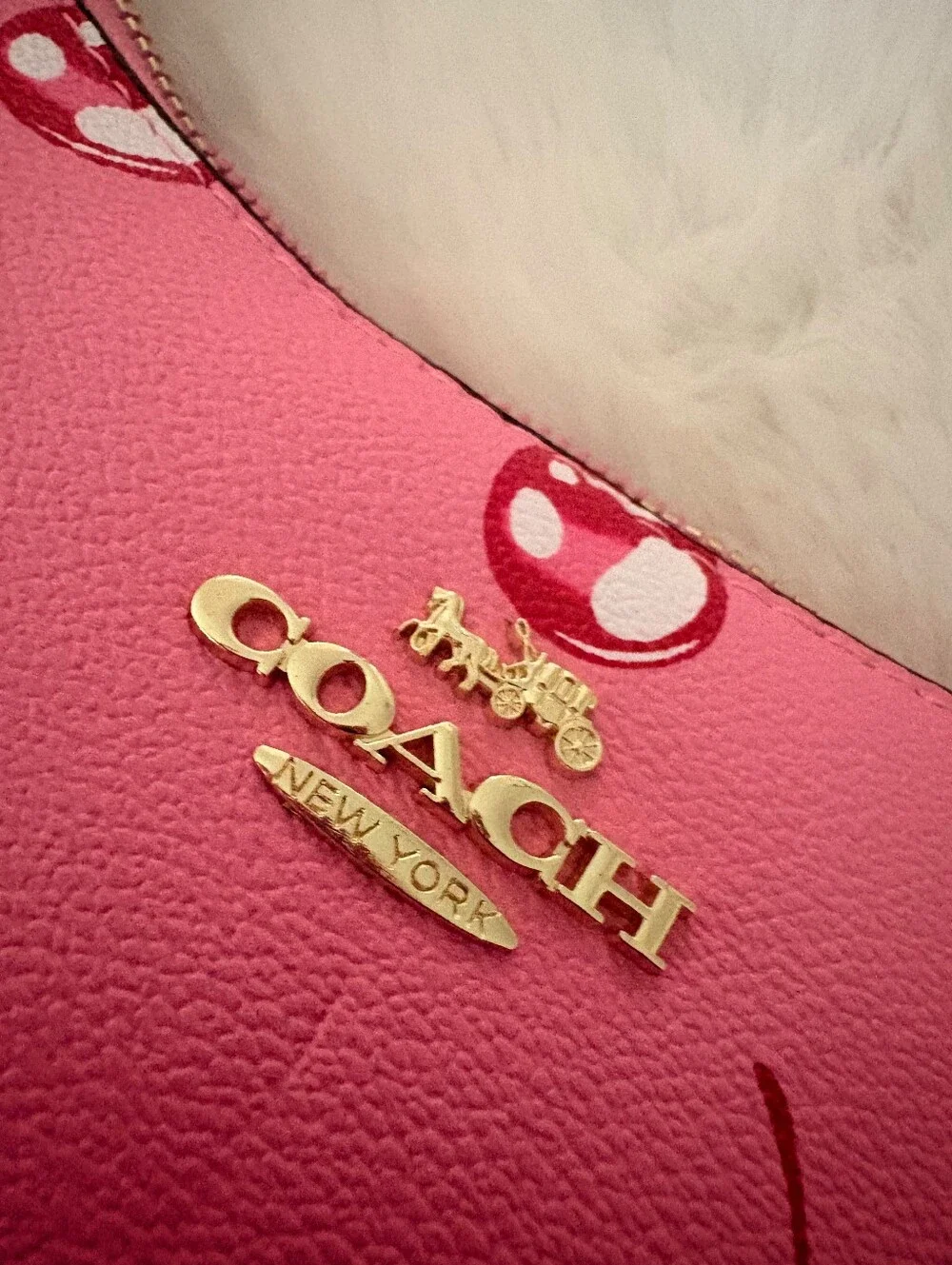 Coach gold tone