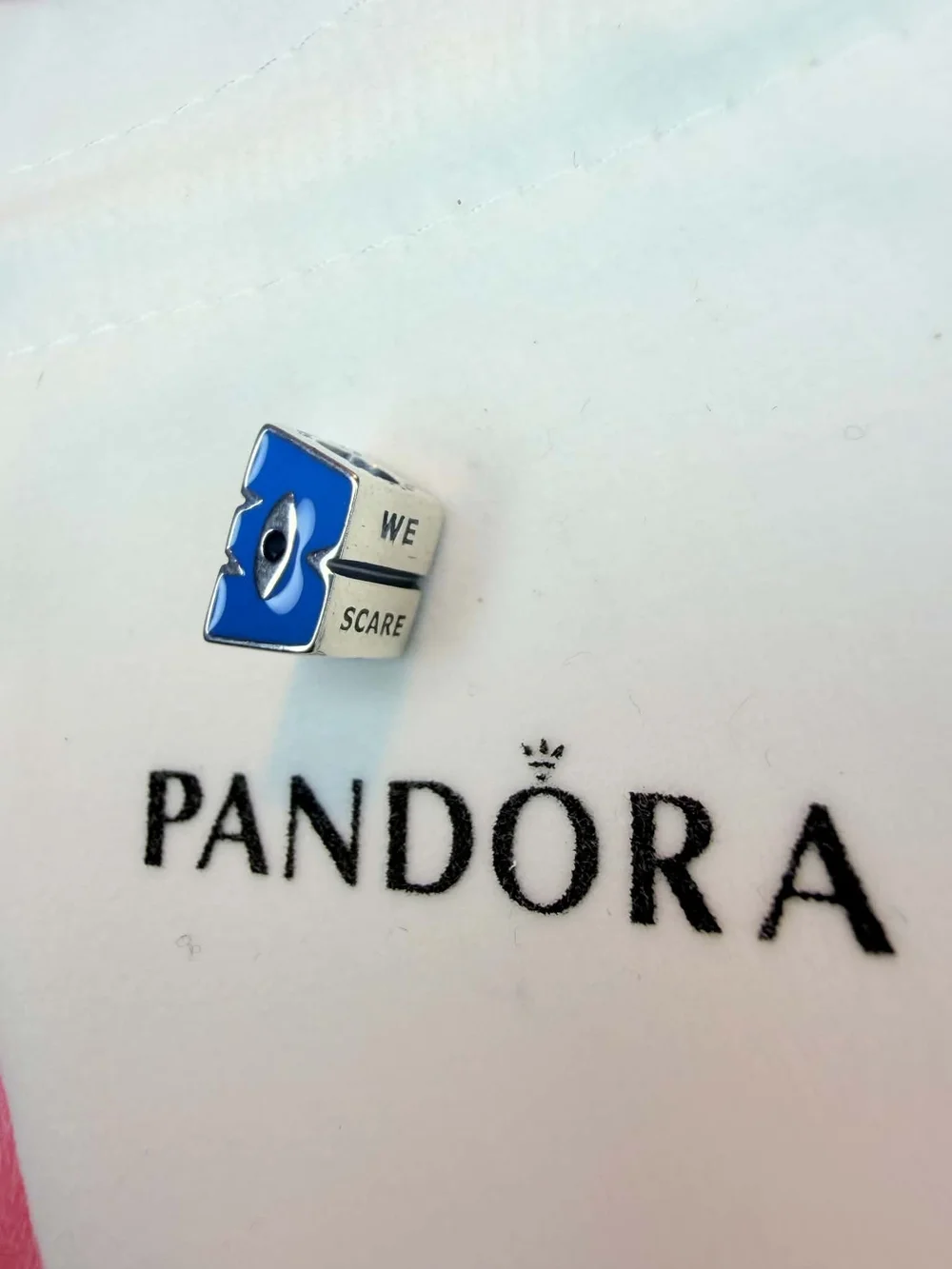 Pandora charm shaped