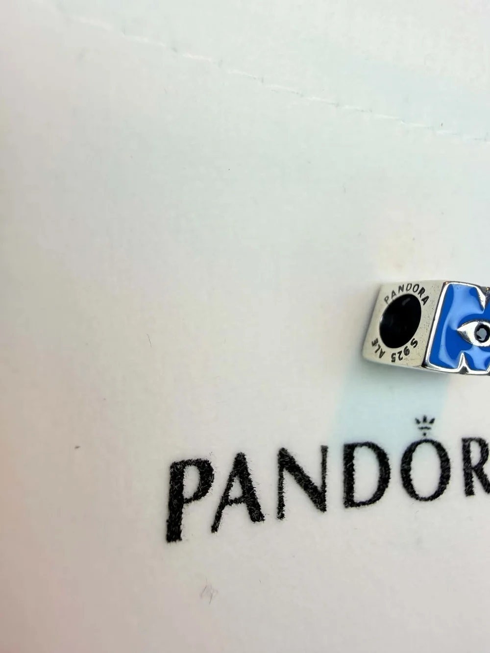 Pandora charm shaped