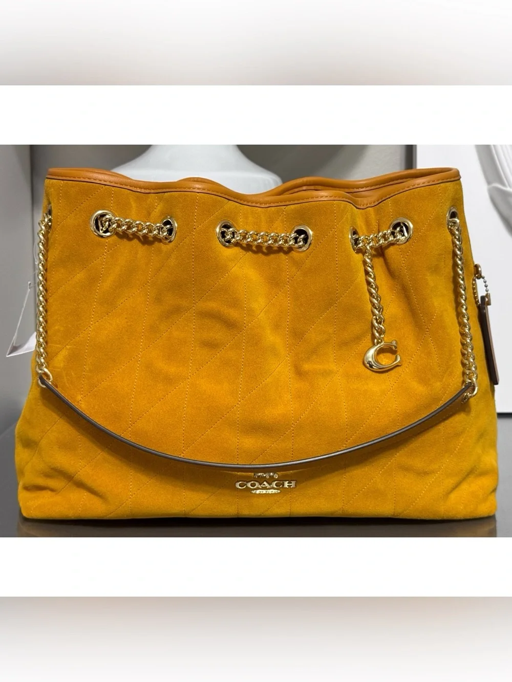 Coach zip top number