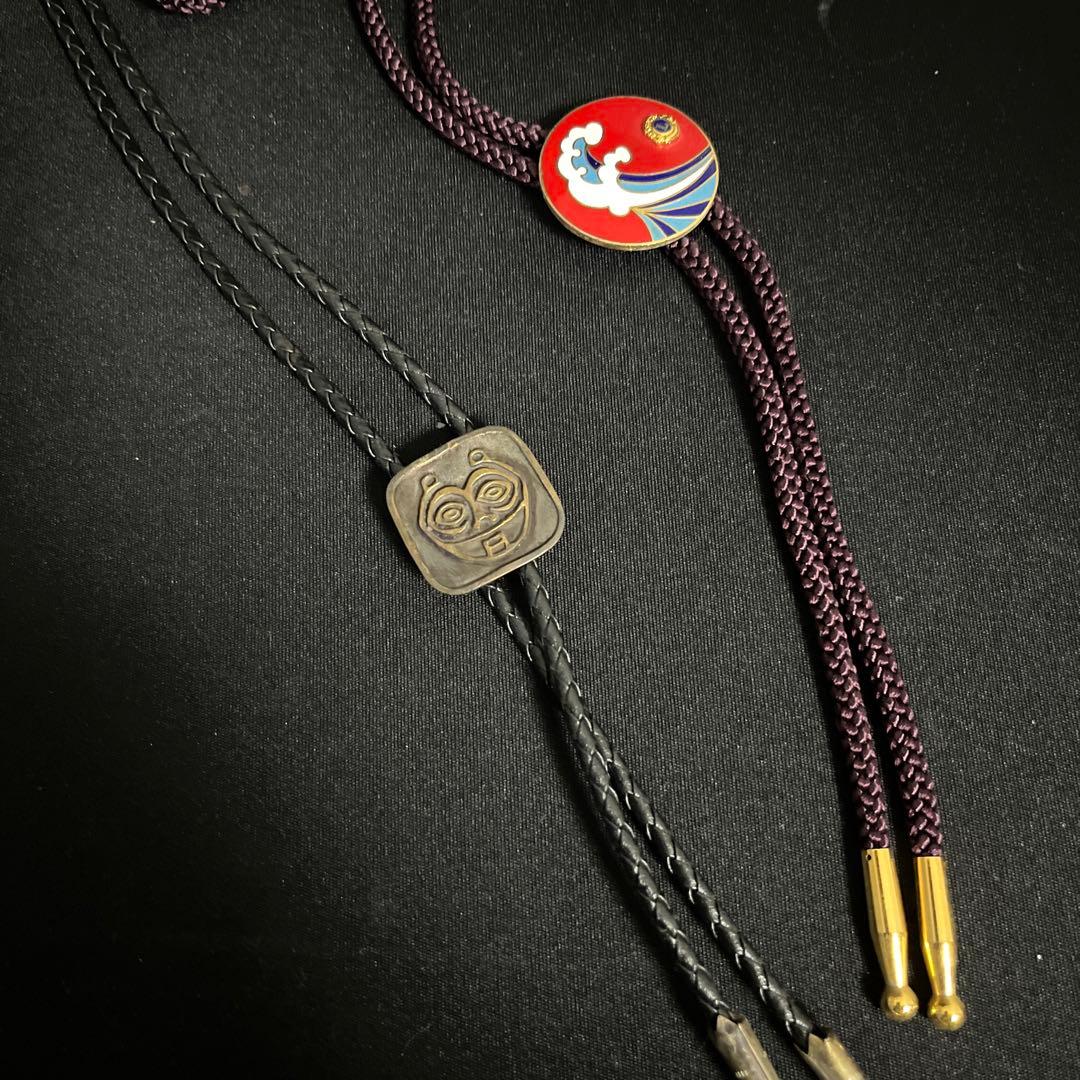 Excellent Condition Red Wave Design Bolo Ties with Face Motifs - Set of 2