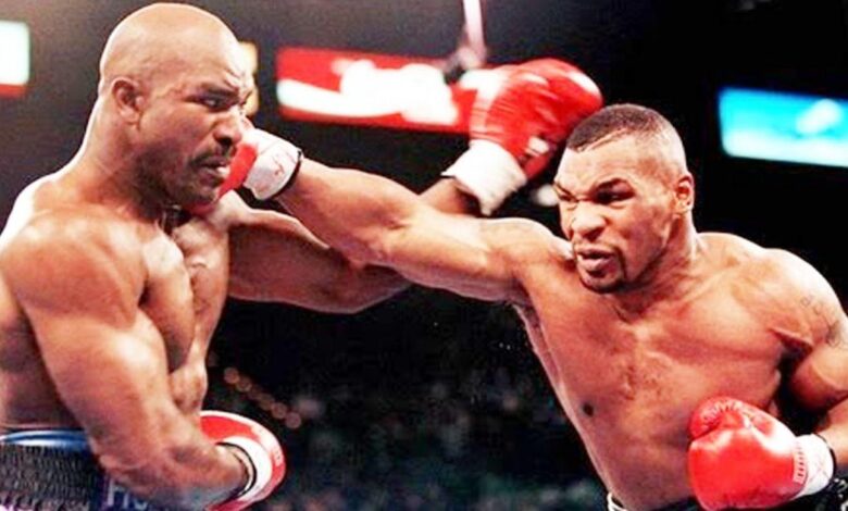 Lutadores de boxe Mike Tyson e Evander Holyfield anunciam volta aos treinos